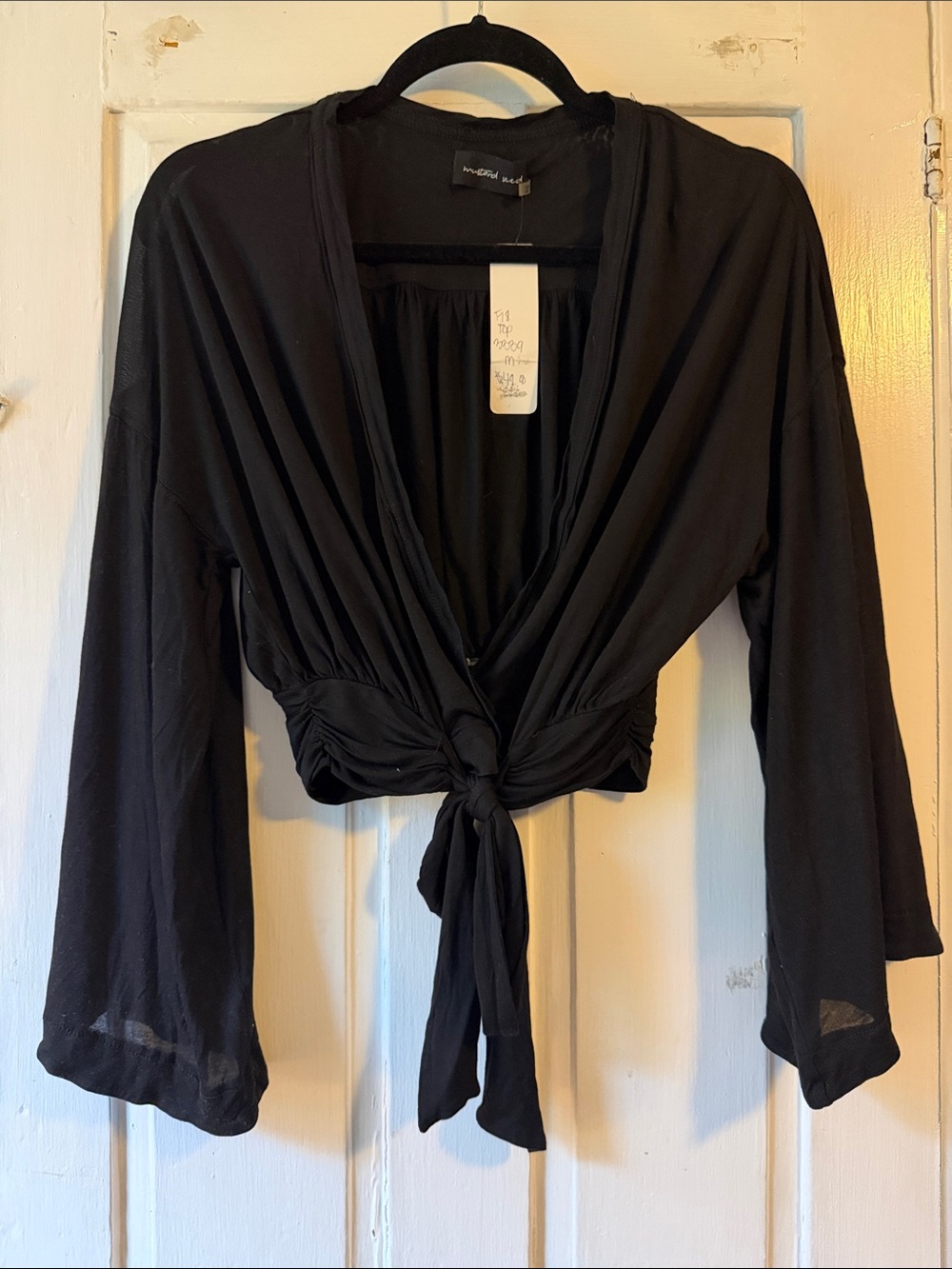 NWT Mustard Seed black wrap-front tie blouse with bell sleeves